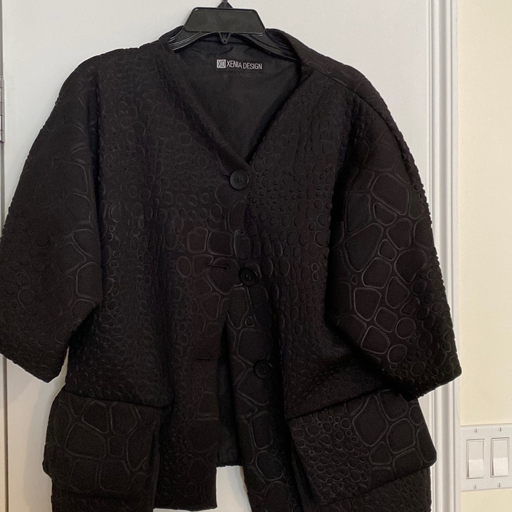Stylish European made jacket.Looks absolutely new. Worn only once.